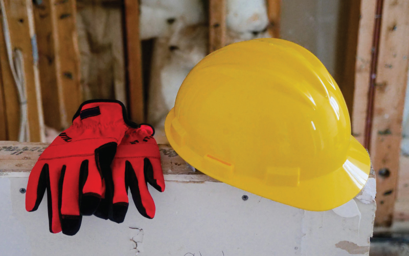 Labor shortages in construction persist as a pair of gloves sit at a empty job site.