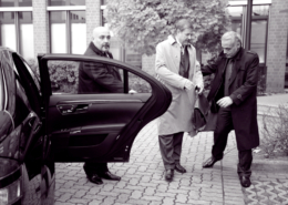 AFIMAC private drivers assist their VIP during a visit to a shareholder meeting.